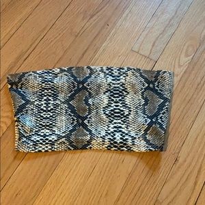 Snake print strapless crop top.
